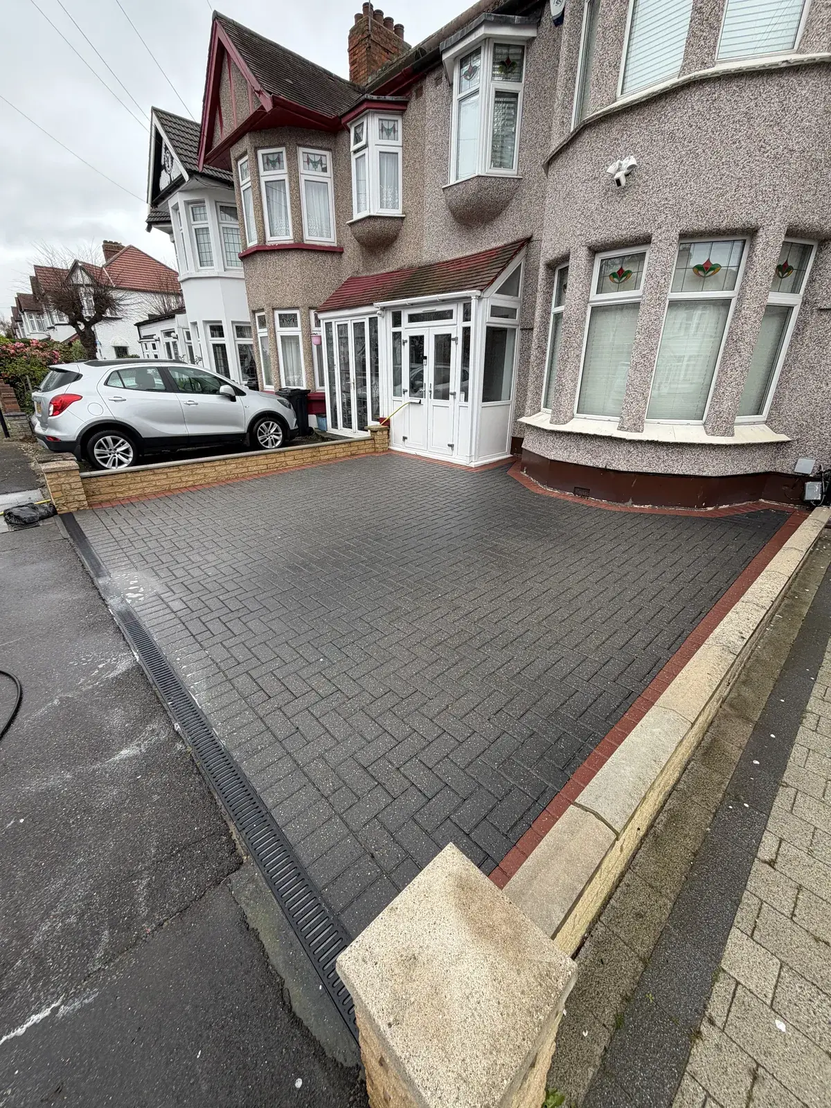 Block paved driveway cleaned back to its original colour