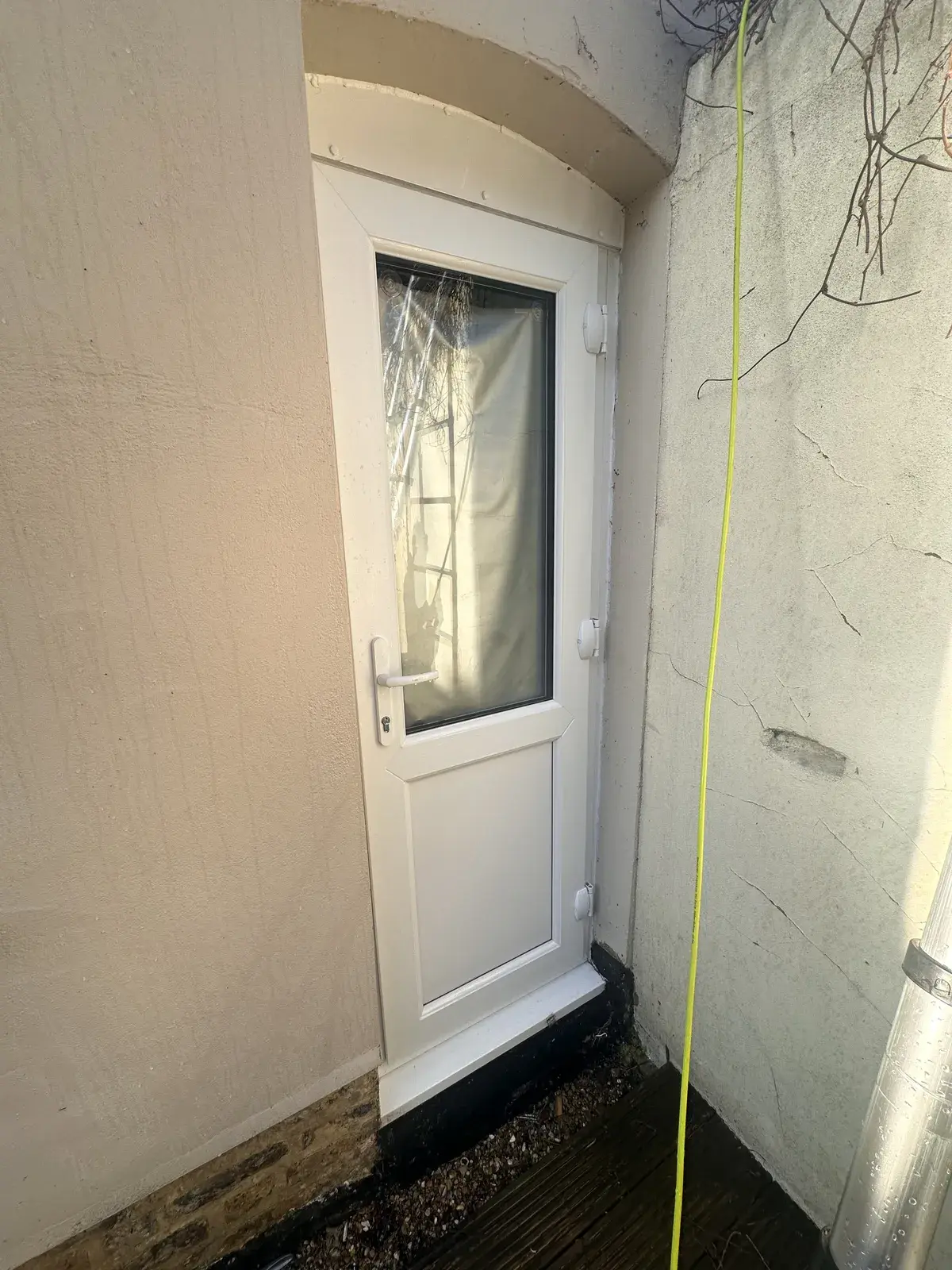 A uPVC front door and frame washed clean